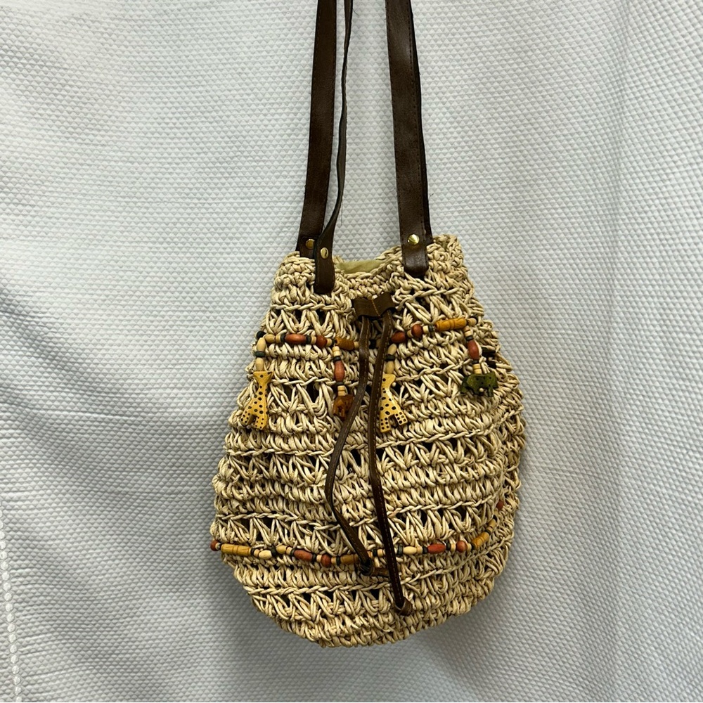 CAPPELLI Straworld Inc.African theme Beige and Brown Woven Bag with Wooden Beads